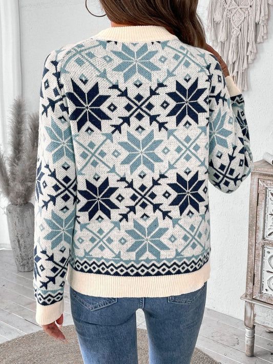 Back view of the blue and white Nordic snowflake sweater, showcasing its cozy design.