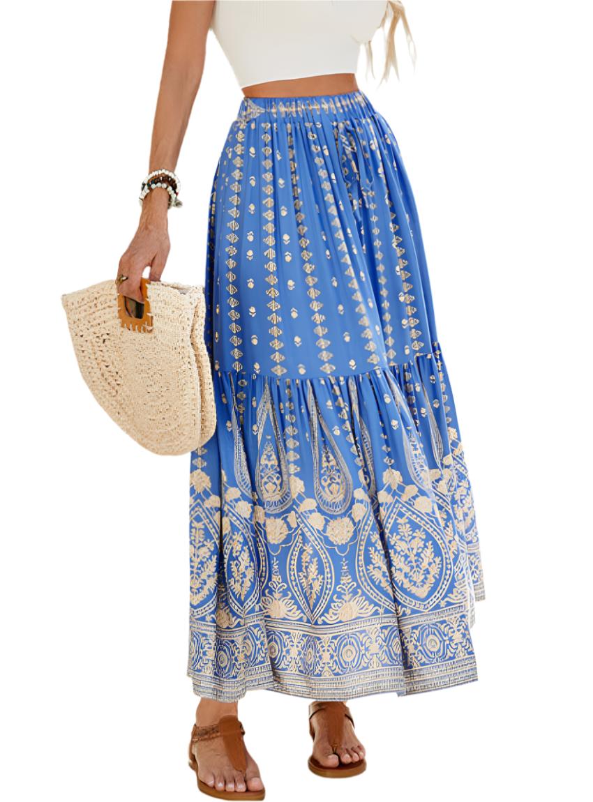 Close-up of blue boho skirt with intricate print and tied waistband detail.