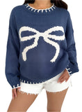 Front view of a blue bow-knot knit sweater, perfect for cozy winter days with a playful bow detail.

