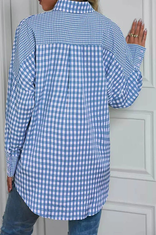 Oversized blue gingham check shirt styled with denim jeans
