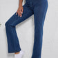 Blue straight-leg jeans with high waist, perfect for casual styling.
