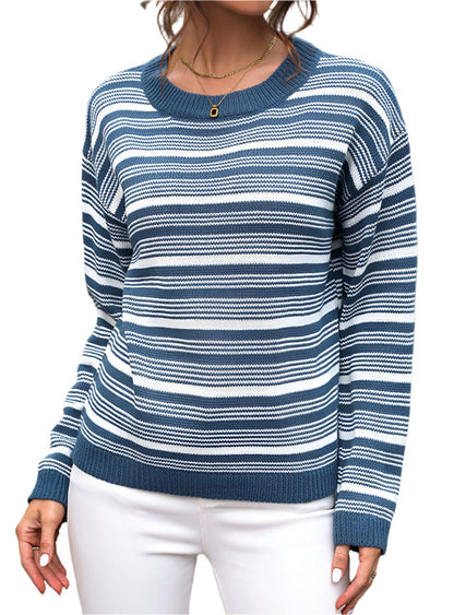 Front view of a cozy blue and white striped round-neck sweater, perfect for casual autumn outfits.

