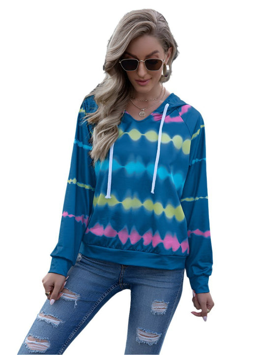 Blue tie-dye hooded sweatshirt featuring raglan sleeves and a drawstring hood for a comfortable, laid-back style.
