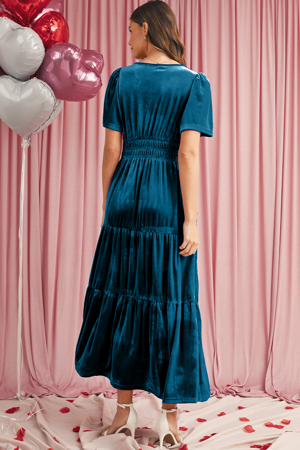 Back view of blue velvet tiered maxi dress with elegant short sleeves
