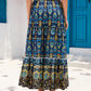 Navy boho maxi skirt styled for a spring or summer casual outfit.
