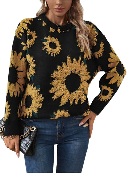 Woman wearing a black knit sweater with bold yellow sunflower designs | boho aesthetic
