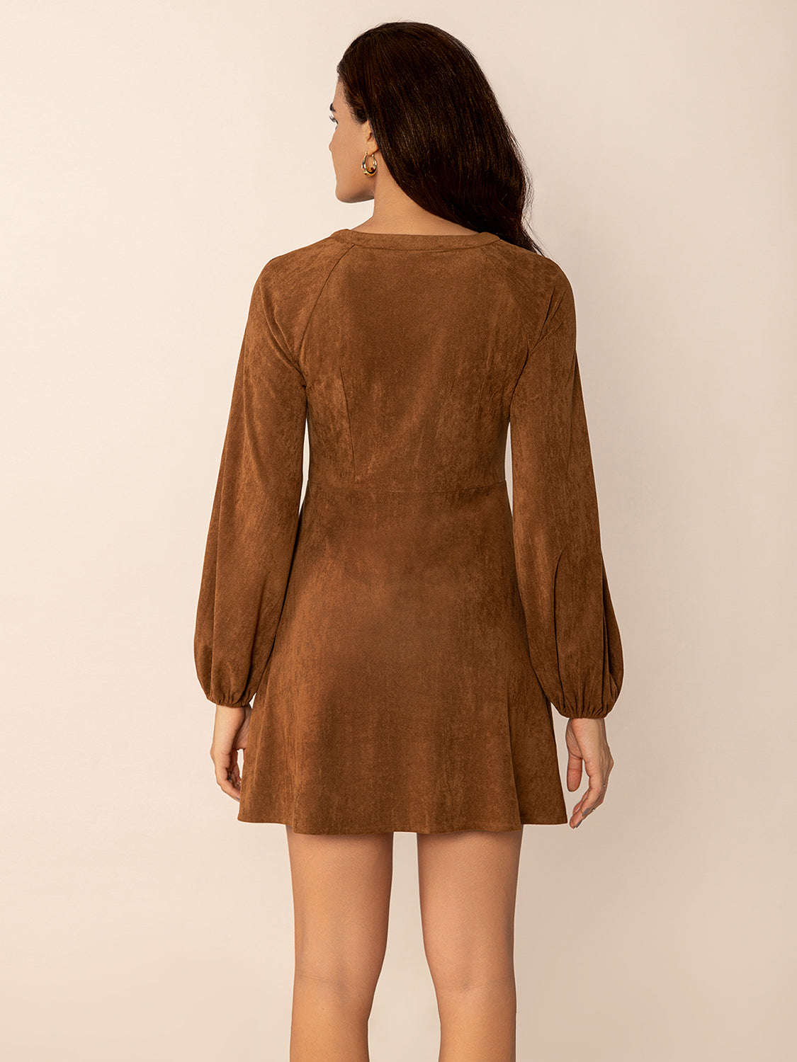 Boho-inspired suede mini dress in caramel with button details
