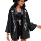 Boho embroidered black kimono cardigan with floral design, front view.
