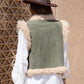 Western-style vest with faux shearling trim and embroidered accents.
