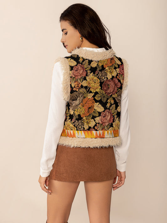 Women’s boho-inspired vest with floral embroidery and faux shearling trim.
