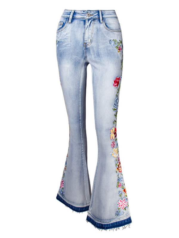 Boho-inspired floral embroidered denim jeans with flared leg.
