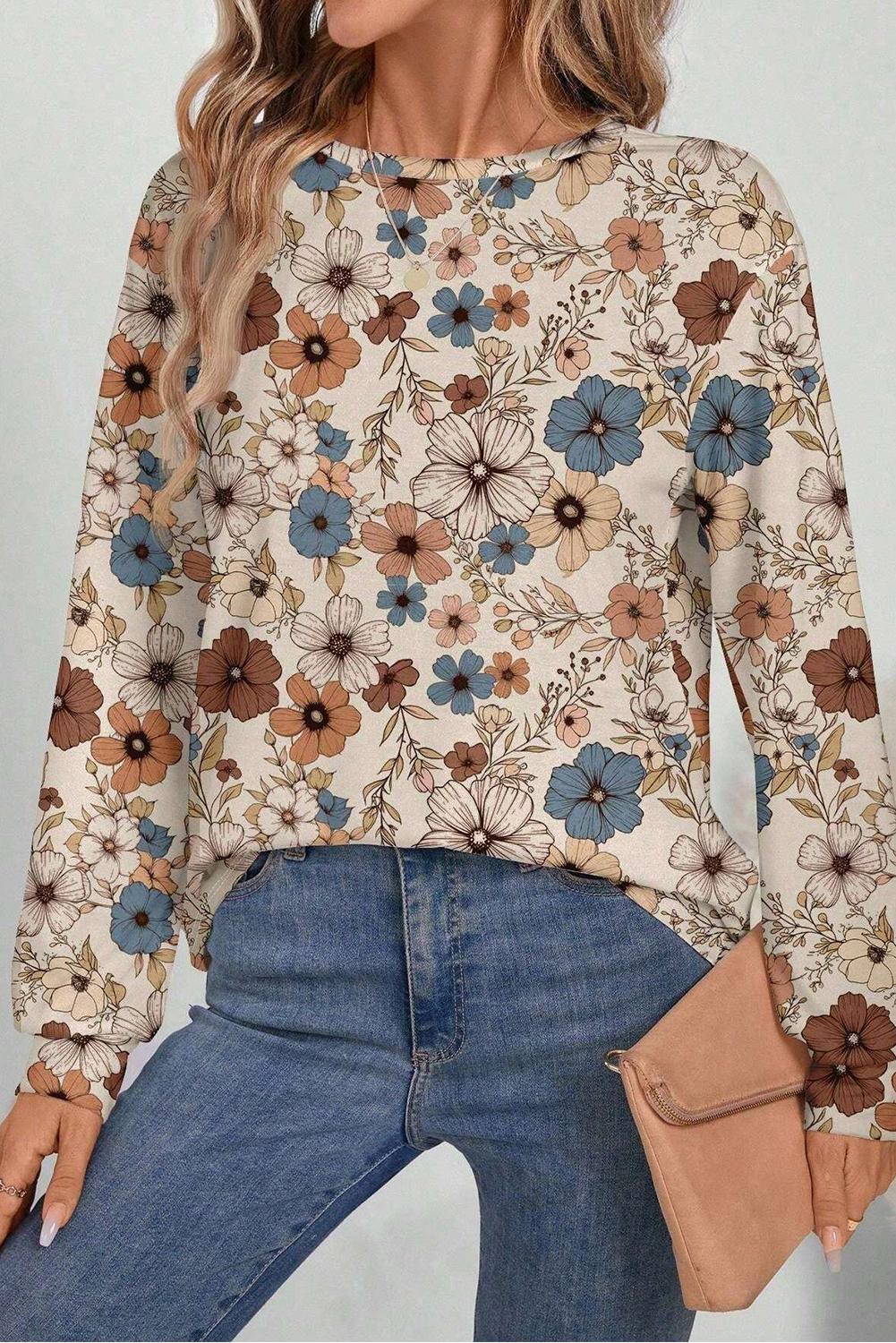 Boho floral print top in warm tones, ideal for casual or dressy occasions.
