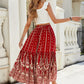 Full view of red boho skirt with tiered maxi fit and intricate print.