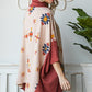 Oversized cowl neck poncho in a southwestern pattern for a boho chic look.