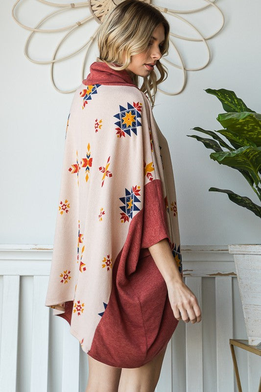 Oversized cowl neck poncho in a southwestern pattern for a boho chic look.