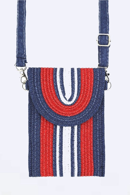 Compact straw phone bag featuring adjustable crossbody strap.
