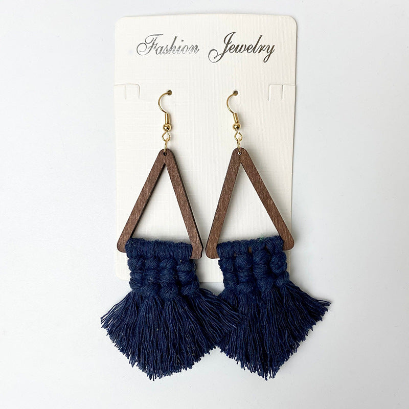 Boho chic earrings with tassel accents in dark blue
