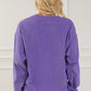 Relaxed fit lavender pullover with a playful "MAMA" graphic