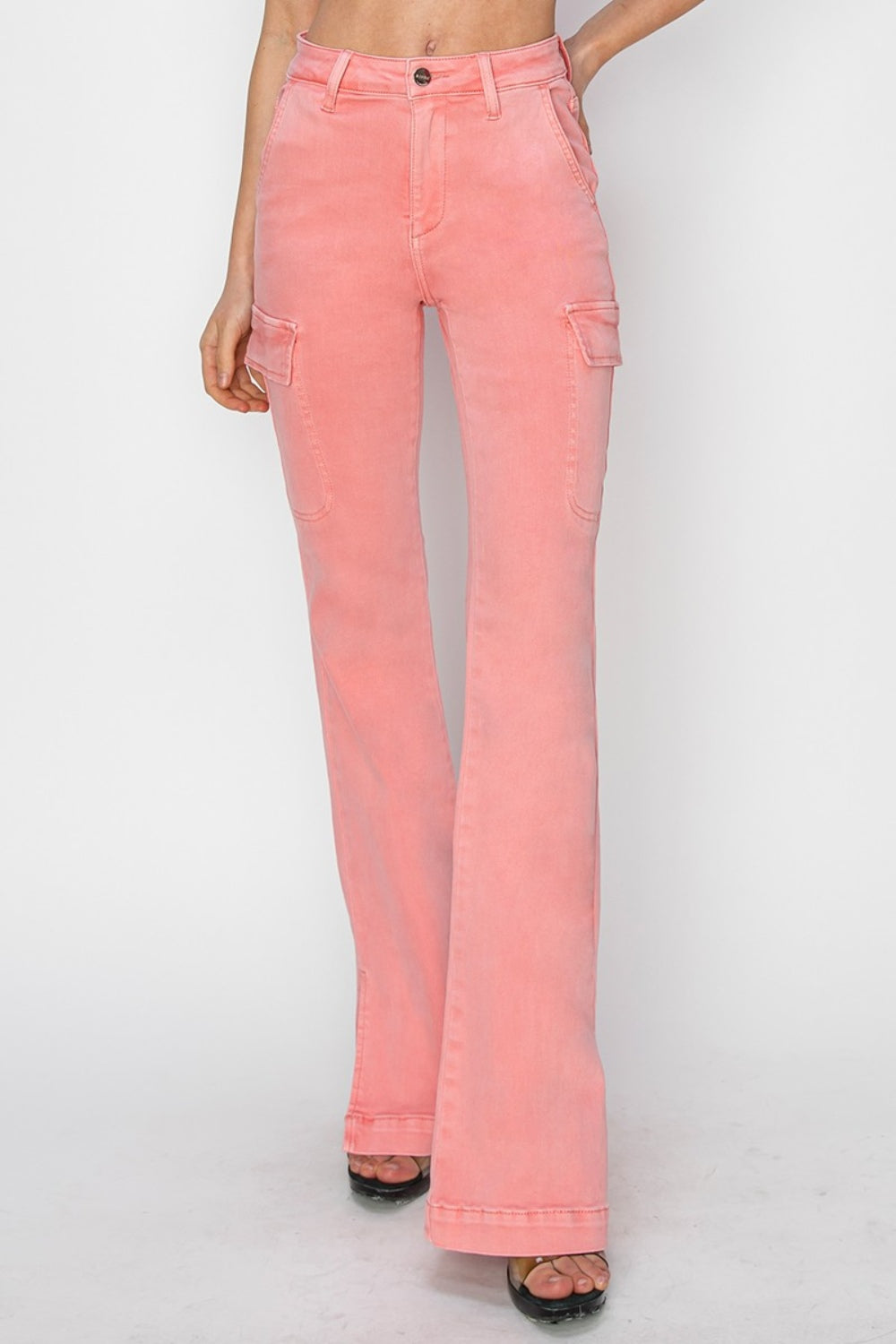 Trendy pink cargo jeans with a bootcut style, front view