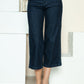 Judy Blue wide-leg jeans styled casually with sandals.
