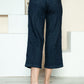 Side view of braided seam detail on cropped Judy Blue wide-leg jeans.
