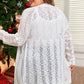 Women's plus size open knit cardigan with a soft, lightweight fabric.
