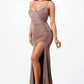 Side view of a bronze gown highlighting the side slit and curve-hugging design.
