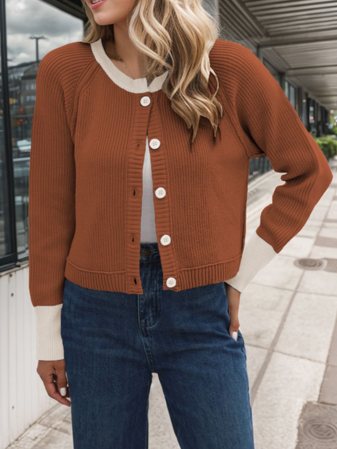 Cozy brown cardigan featuring beige contrast trim, perfect for fall layering and seasonal style.