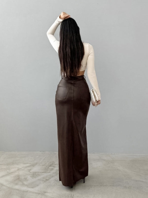 Brown leather-look maxi skirt with front slit detail, sizes S-XL.
