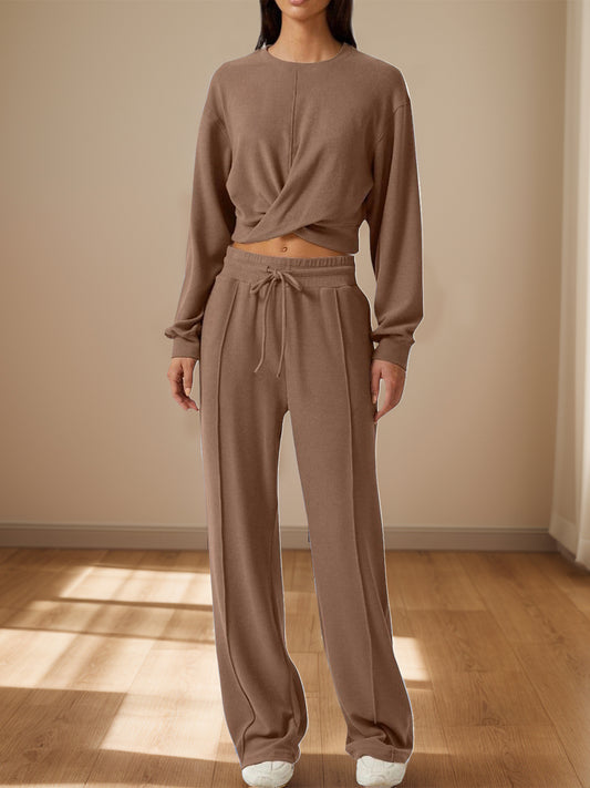 Brown twist-front cropped lounge sweatshirt with matching wide-leg pants.
