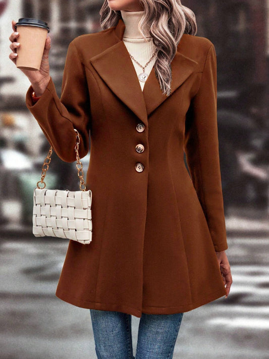 Front view of a brown women’s coat with buttoned closure, tailored for a sleek look
