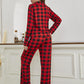 Button-up plaid pajama top paired with matching drawstring pants.
