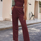 Burgundy 3-piece women's pant suit with wide-leg pants and a long duster jacket
