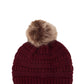 Burgundy vegan slinky beanie featuring a cruelty-free pom-pom.
