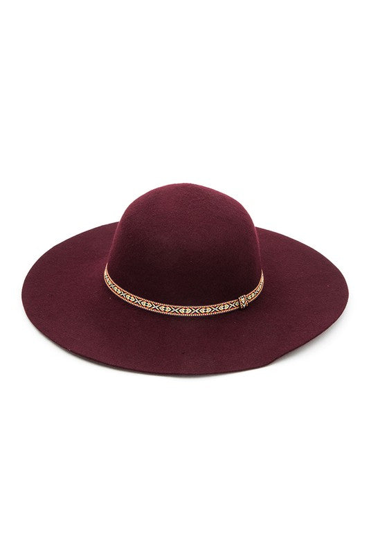 Fashionable burgundy floppy hat perfect for casual or seasonal outfits.
