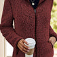 Burgundy women's fleece sherpa jacket, offering warmth and comfort for casual outings.
