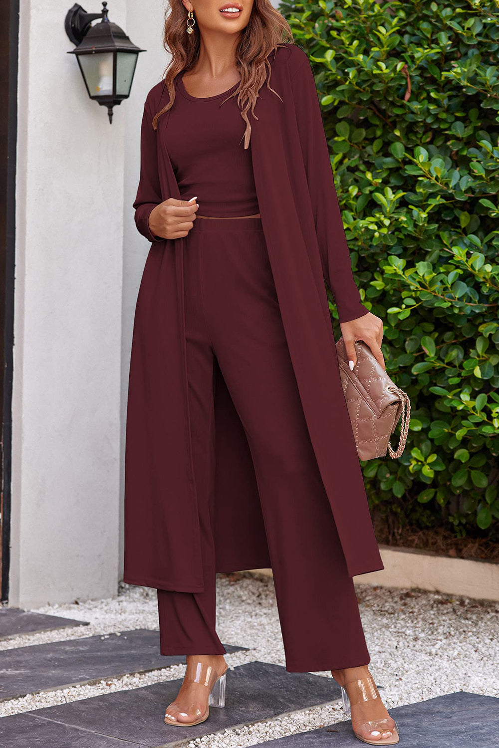 Burgundy 3-piece pant suit featuring a chic duster jacket and relaxed fit
