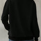 back view of cozy black butterfly floral sweatshirt
