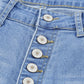 Front view of button-fly distressed raw hem flare jeans in light blue denim with knee distressing and a high waist.