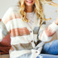 cozy button-down cardigan with warm stripe pattern
