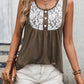 Sleeveless brown top with lace trim and button accents.