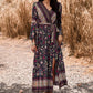 Maxi Dress with floral print and elegant tie-waist belt.
