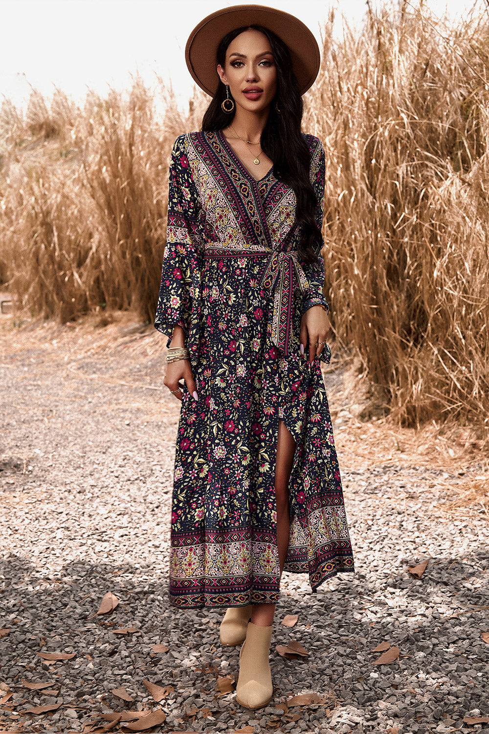 Maxi Dress with floral print and elegant tie-waist belt.