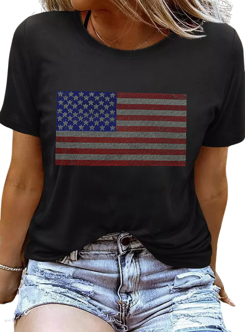 Sparkle in this Black Rhinestone American Flag Tee! Perfect blend of patriotism and style for any casual or celebratory occasion.