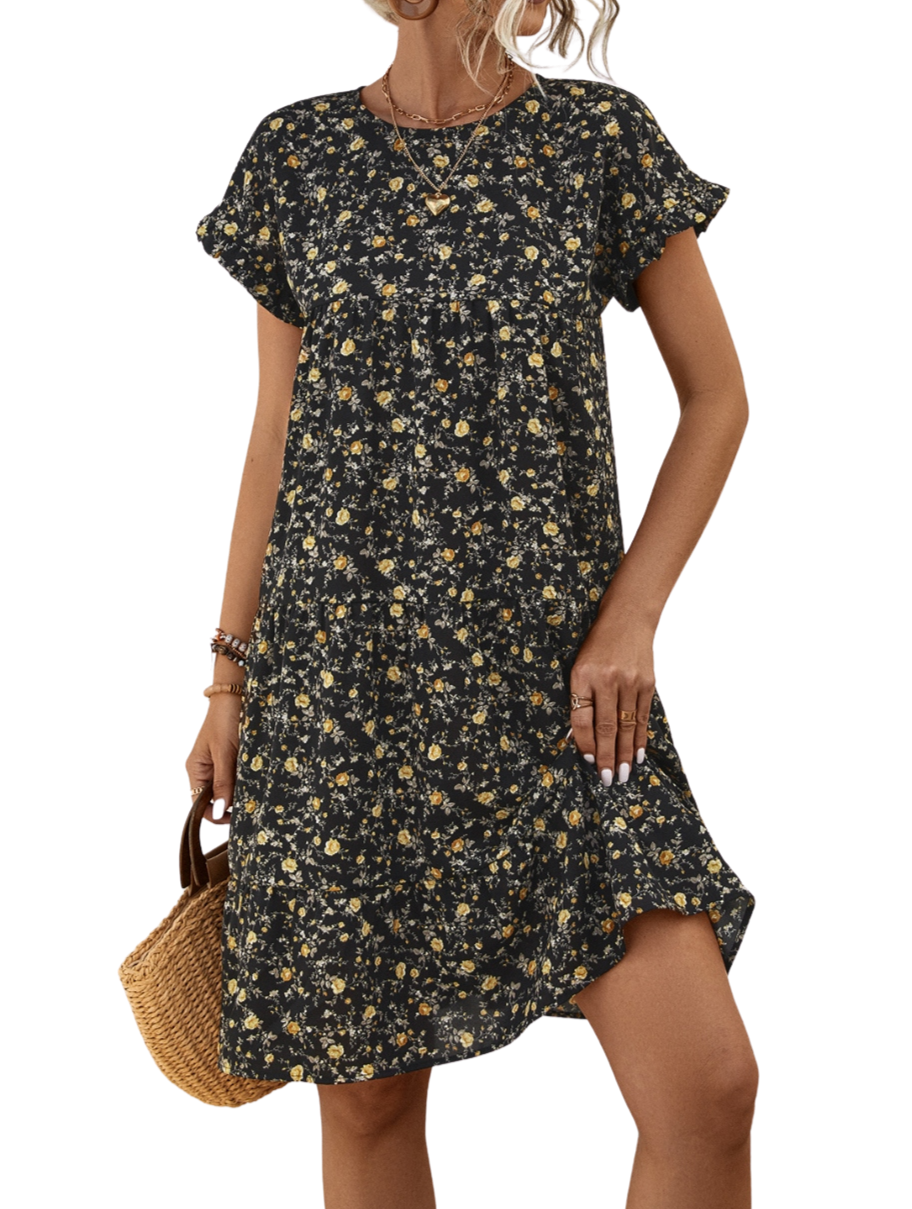 Summer's charm in a dress! Discover our Floral Tiered Dress, perfect for day/night elegance. Available in black and sand.