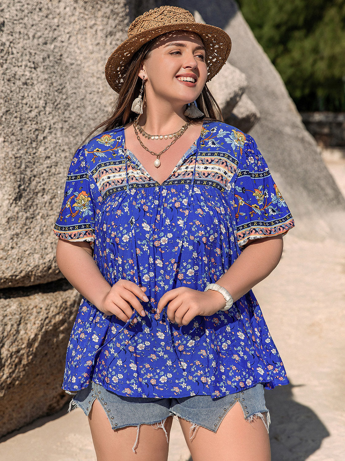 Plus-size boho blouse with vibrant blue floral pattern