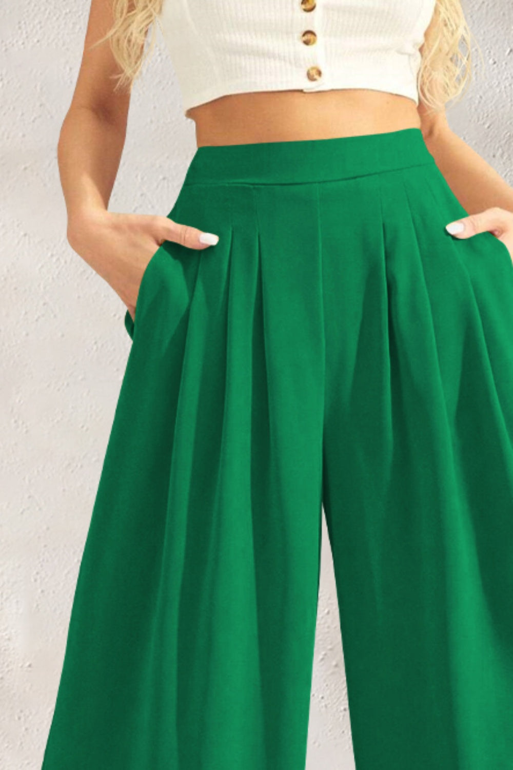 Discover elegance with our Wide Leg Pants - perfect high-waist fit, versatile style, and pocketed design for modern women.