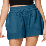 Chic peacock blue drawstring shorts with a comfy fit and stylish raw trim. Also in white and hot pink for every occasion!