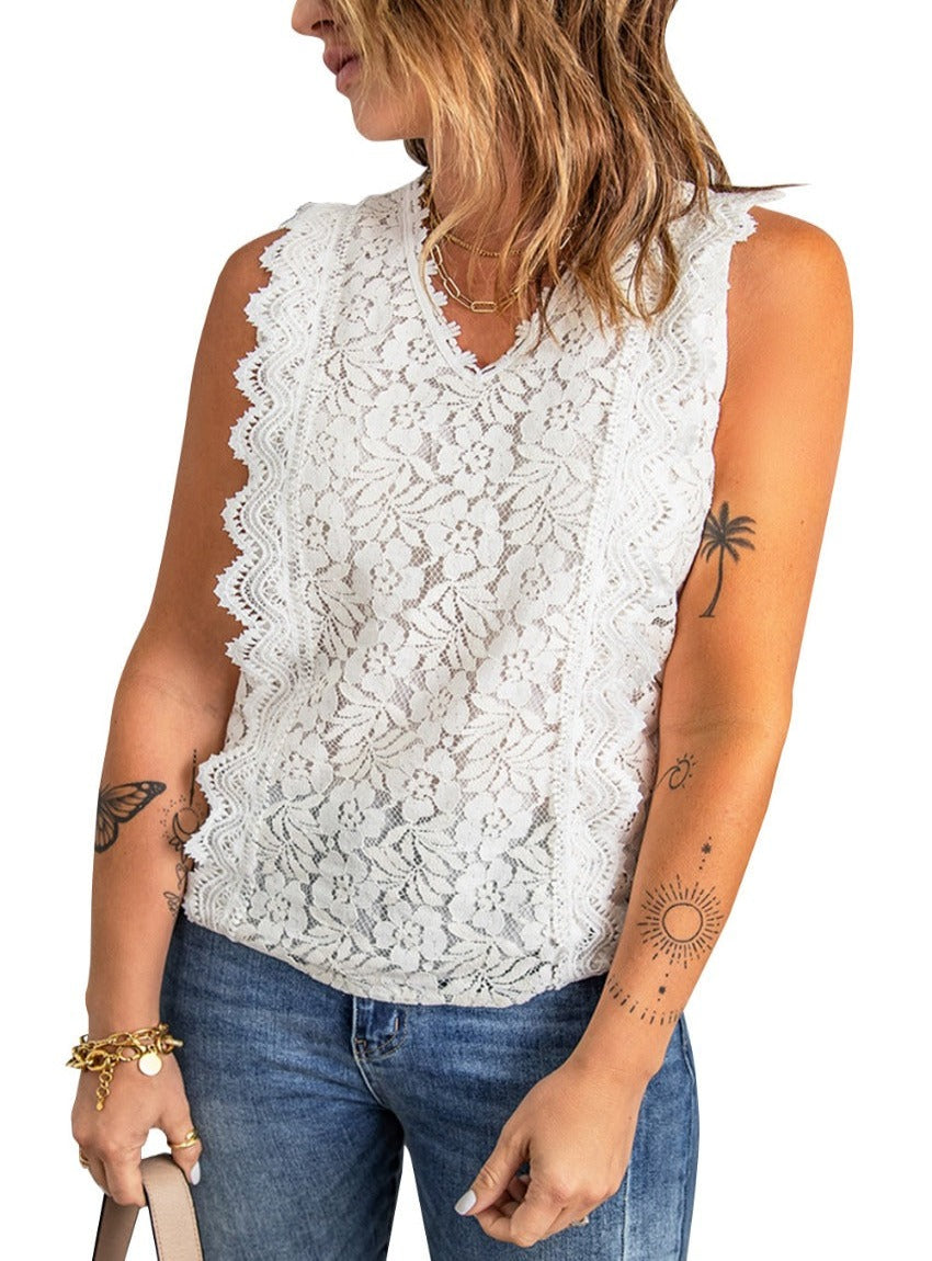 White sleeveless lace top with intricate floral detailing