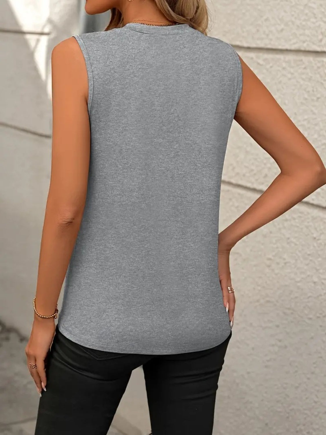 Stylish Round Neck Sleeveless Tank in various colors. Perfect blend of elegance & comfort for any occasion. Shop your go-to summer essential now!